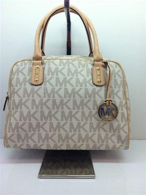 precio bolsa michael kors original|bolsas Michael Kors originales.